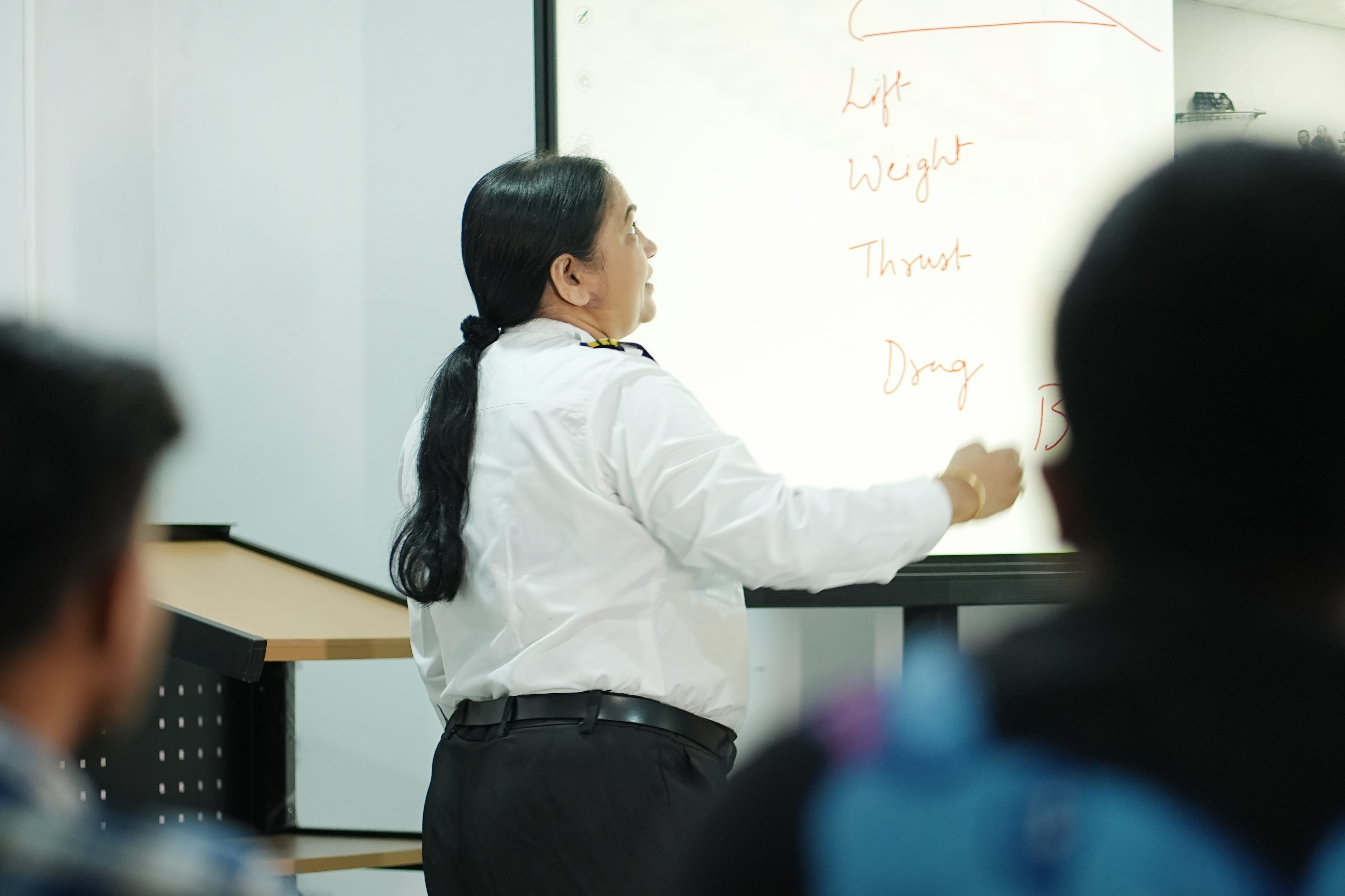 Captain Preeti Mehadia teaching aviation students at CPAC