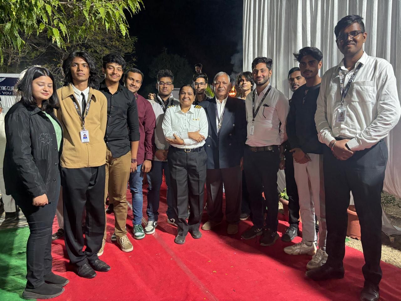 Captain Preeti with Captain Manoj and CPAC students at an aviation event